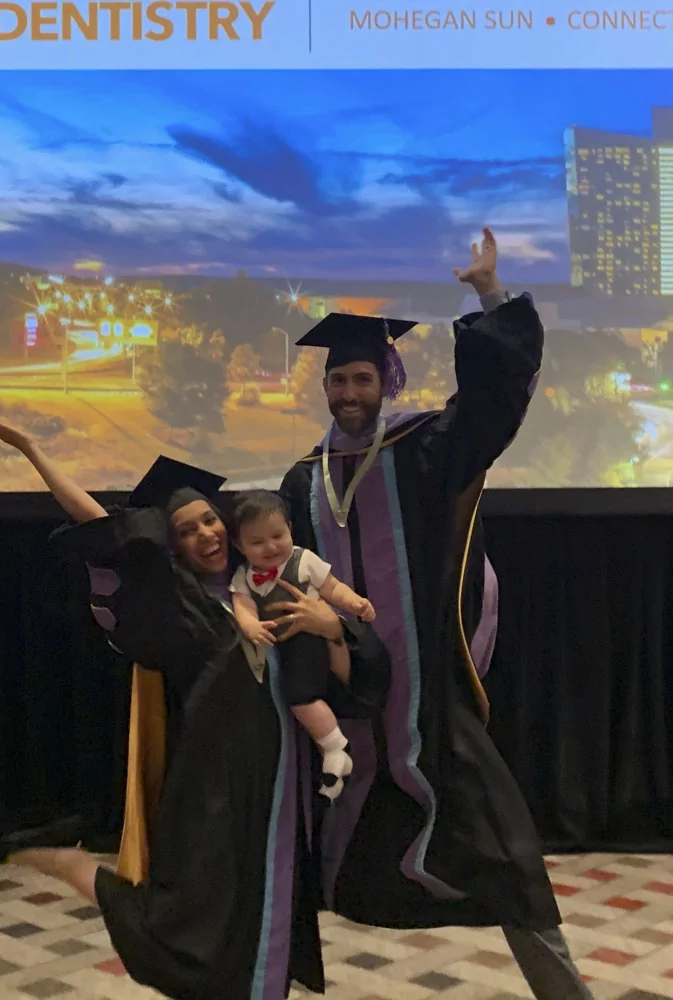 dr. jacquelin marano and dr. david lepelletier in cap and gown